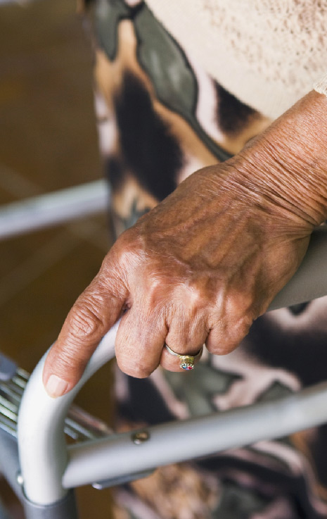 hand-of-elderly-woman-clutching-a-walker hand of elderly woman clutching a walker