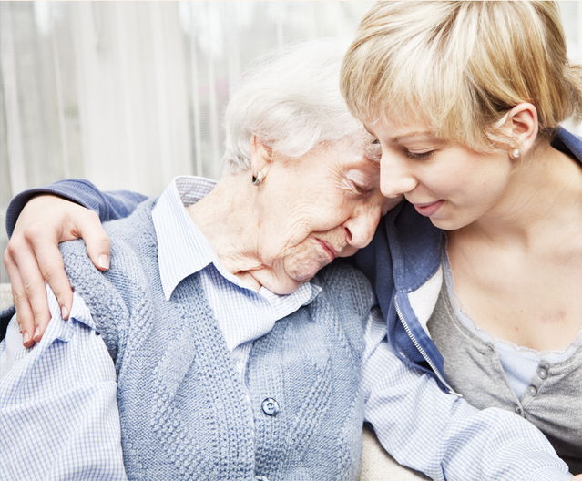 Daughter hugging Grandmother Daughter hugging Grandmother